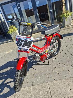Tomos