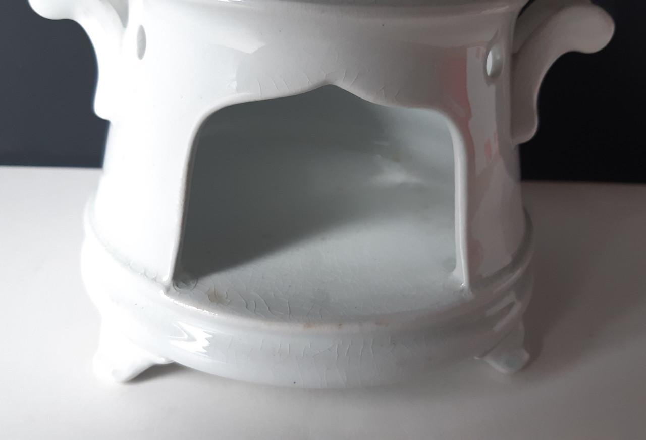 Petrus Regout wit theelicht op pootjes met vetschuitje