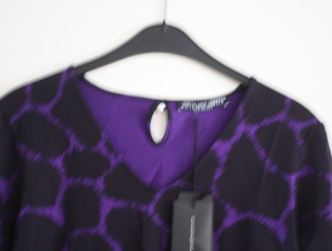 Niieuw shirt met 3/4 mouwen zwart paars maar L