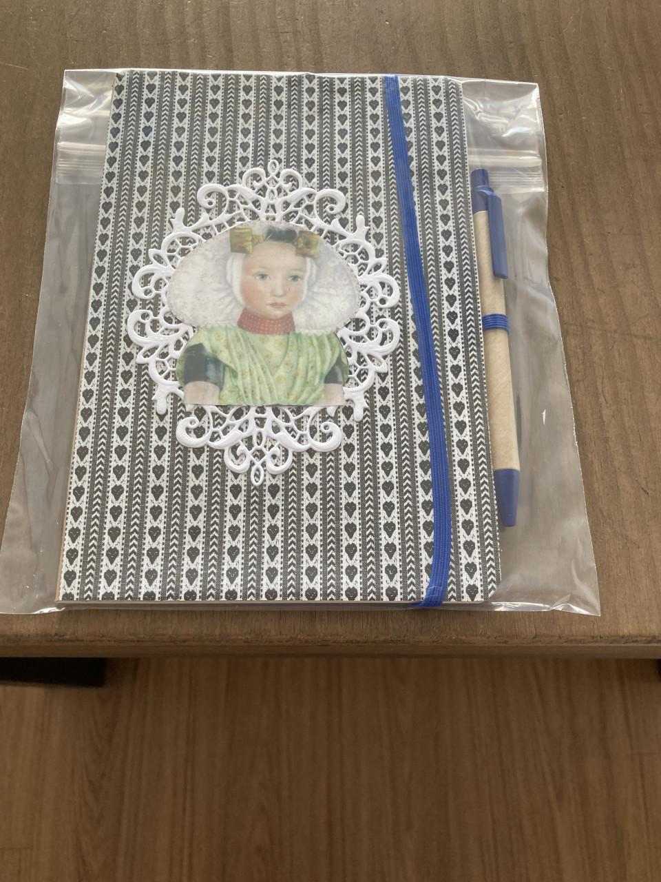 Notitieboekjes met pen