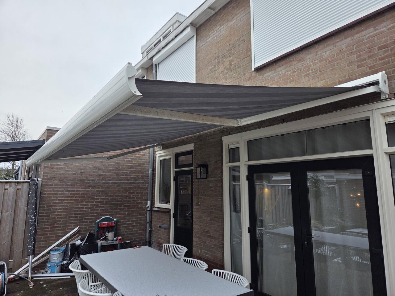 Zonnescherm Somfy motor