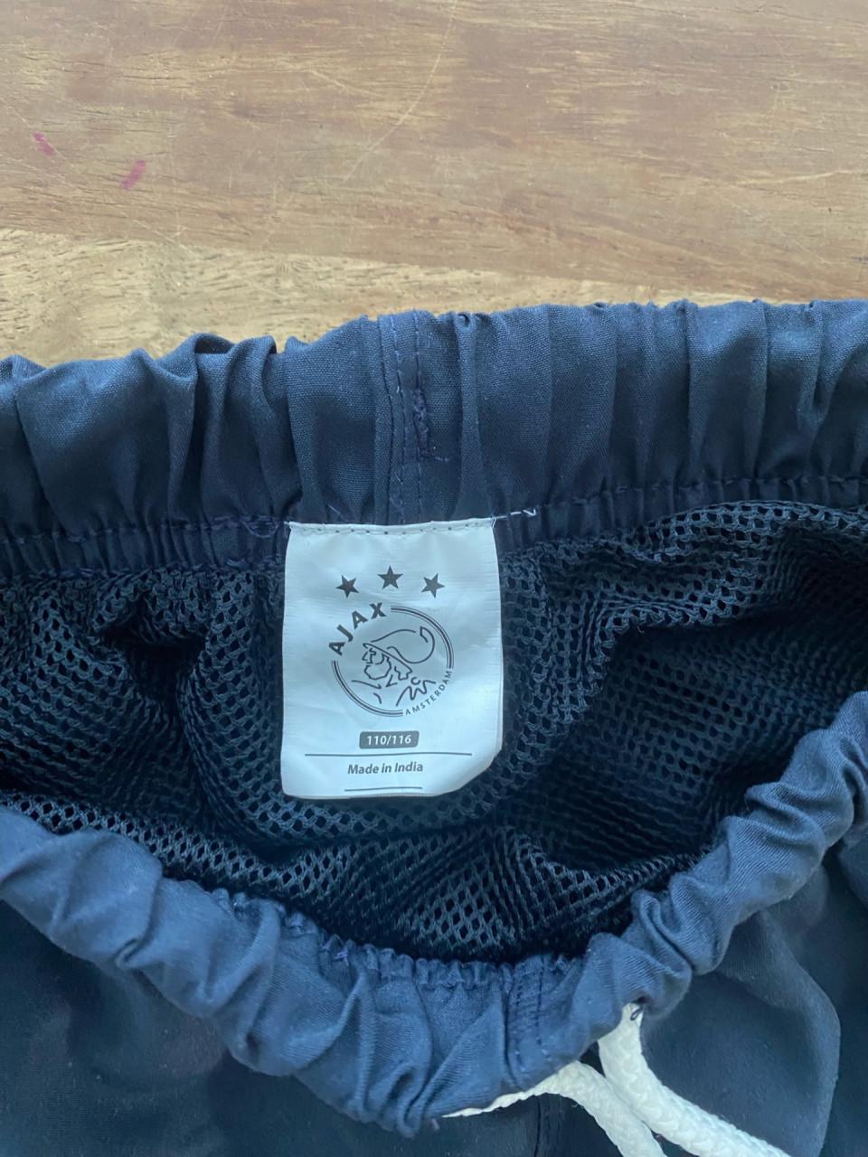 Zwembroek van Ajax maat 110-116.