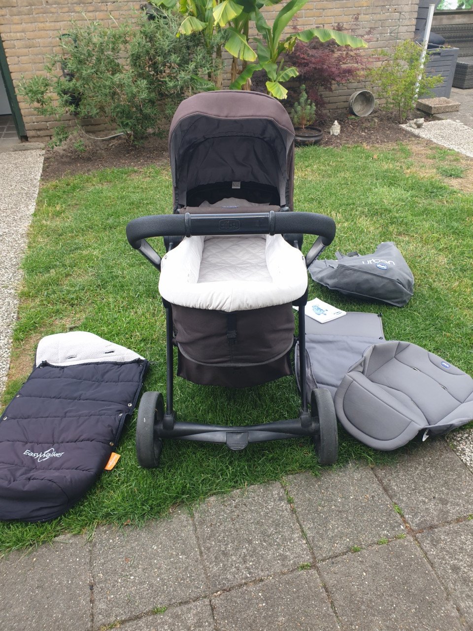 Kinderwagen/ Buggy met voetenzak/ regenhoes merk Chicco Uraban plus