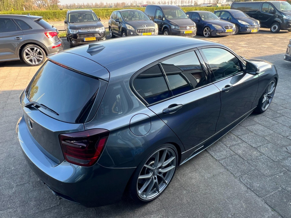 BMW 1 Serie m135i xdrive high executive, customized, stage 2 437 pk!