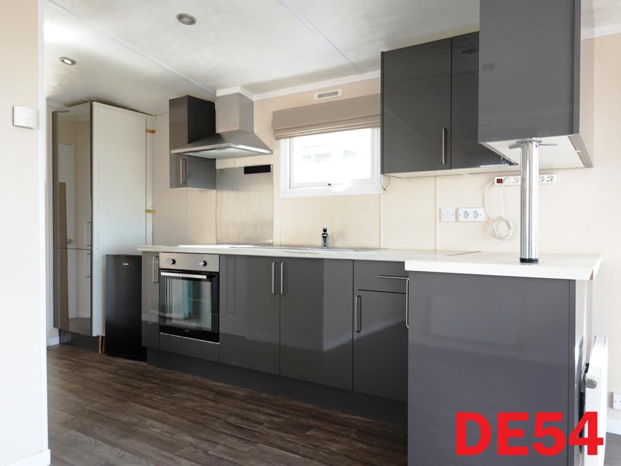 Keurig chalet met 2 slk, dubbel glas en centrale verwarming te koop!