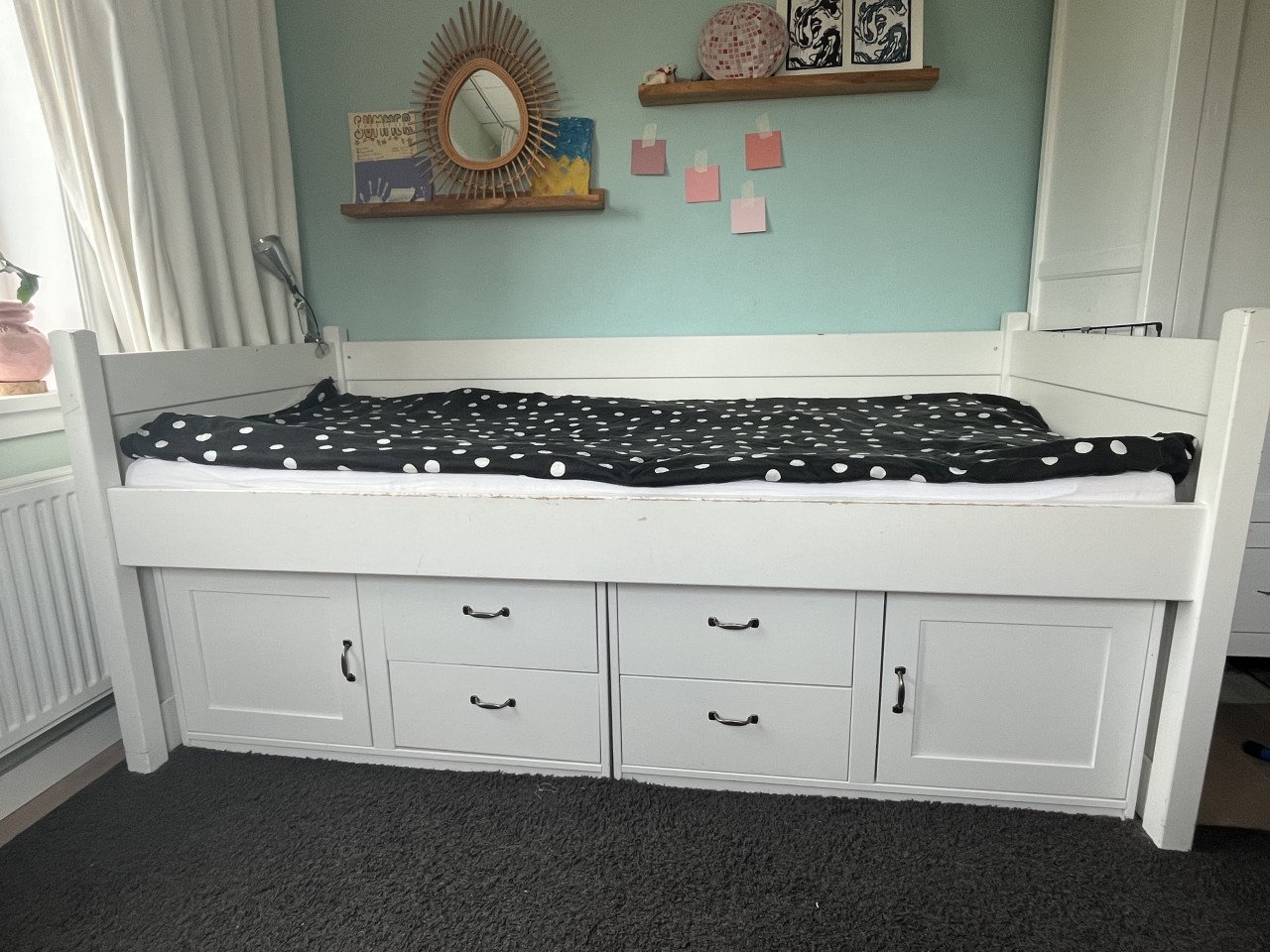 Bed met opbergruimte