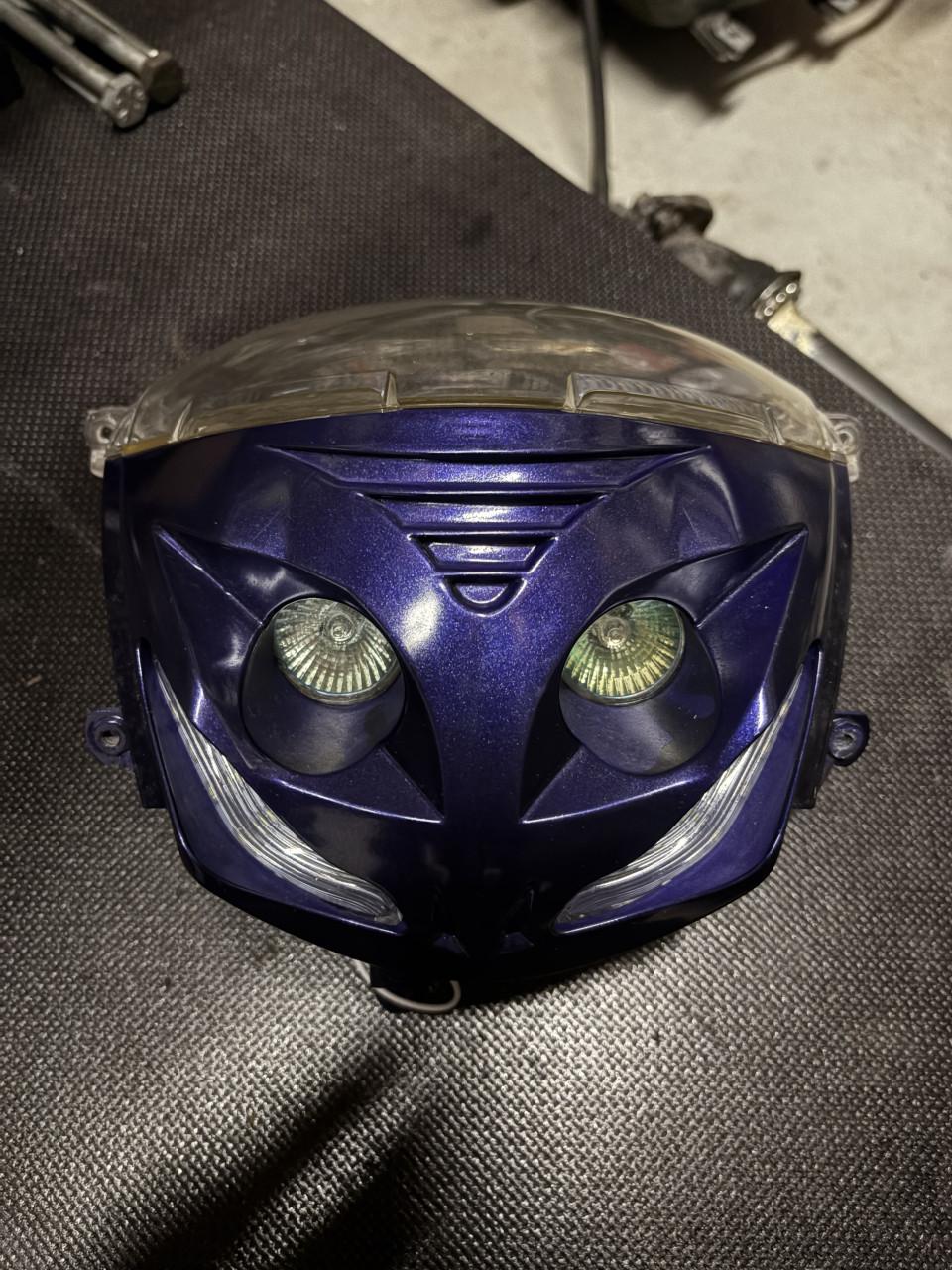 Piaggio Zip boos/blij kijker