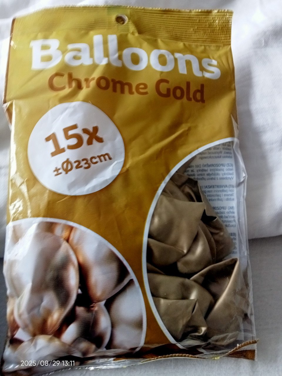 Goud kleurige ballonen met een ballon pompje