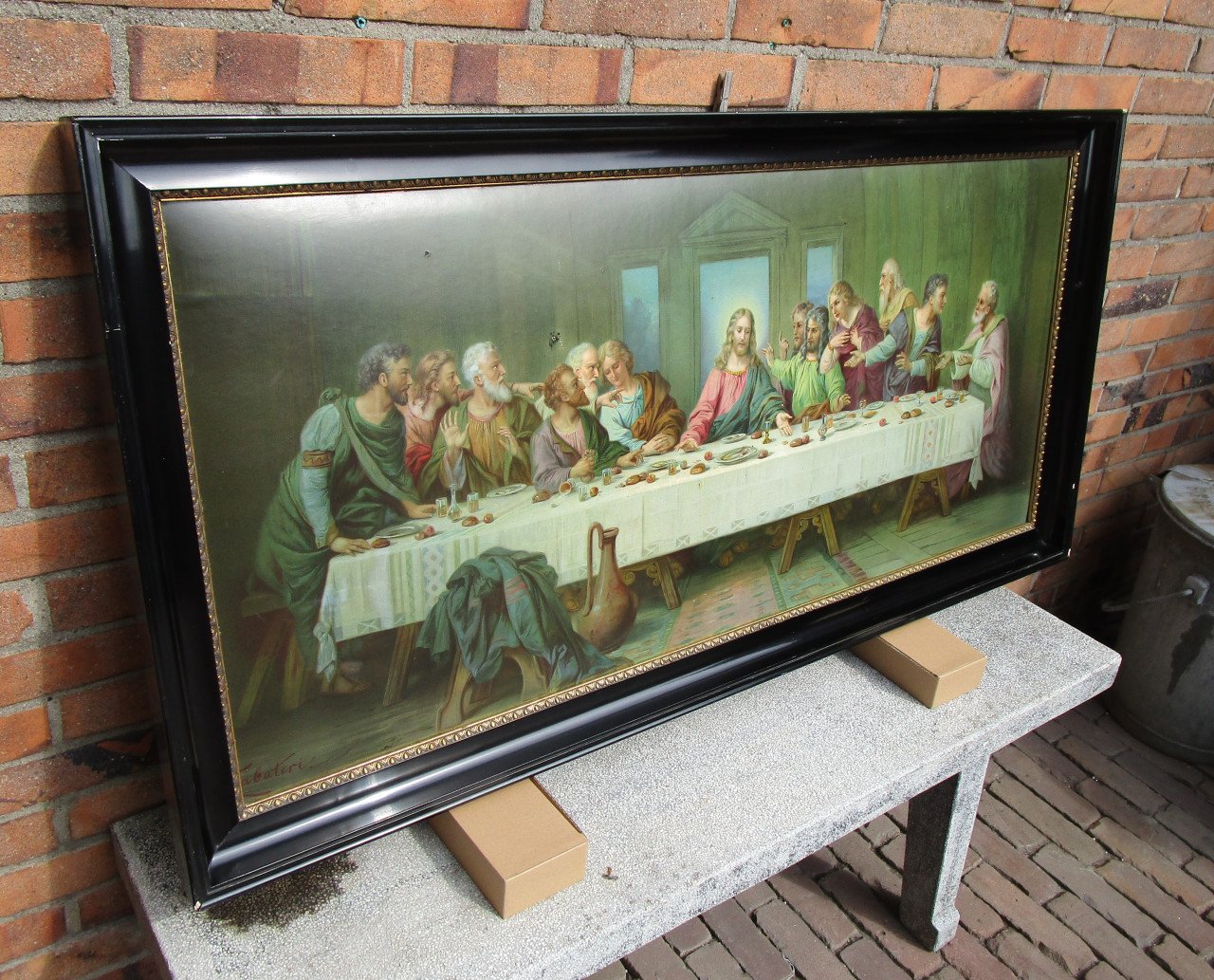 Prent van Het laatste avondmaal in een mooie zwarte lijst.