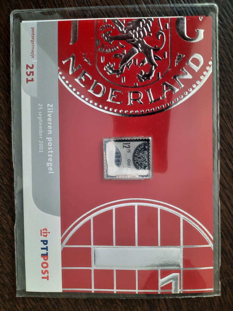 Zilveren postzegels + munten