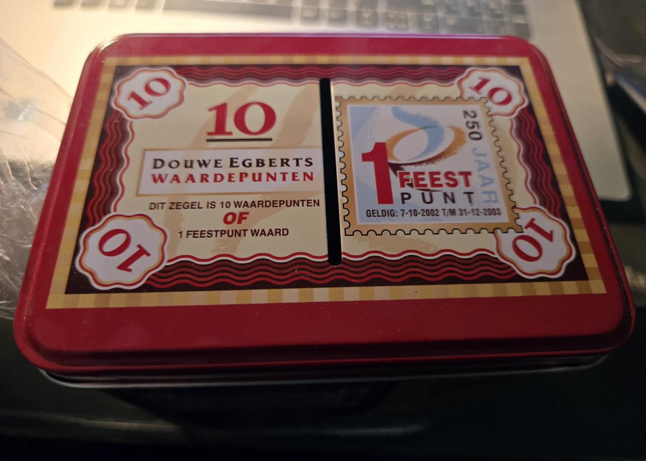 Vintage Douwe Egberts waardepuntenblik met een handige houder