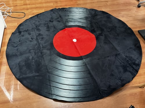 Rond tapijt in de vorm van een LP (doorsnede 2 meter)