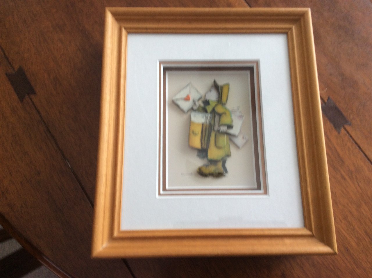2 Houten lijstjes met 3-dimensionale afbeelding van een Hummeltje.