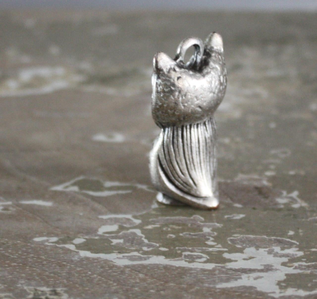 Zilverkleurige ketting hanger uil