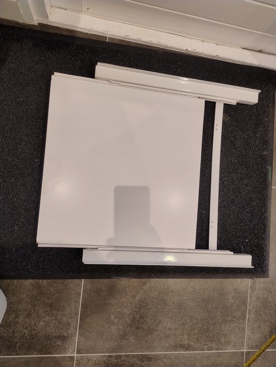 Schuiflade voor tussen wasmachine en droger