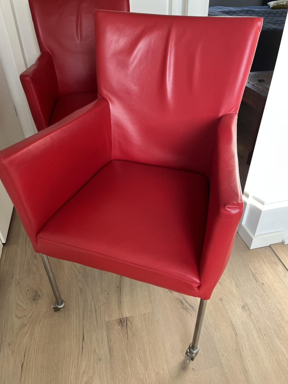 Twee Creafort fauteuils rood leder