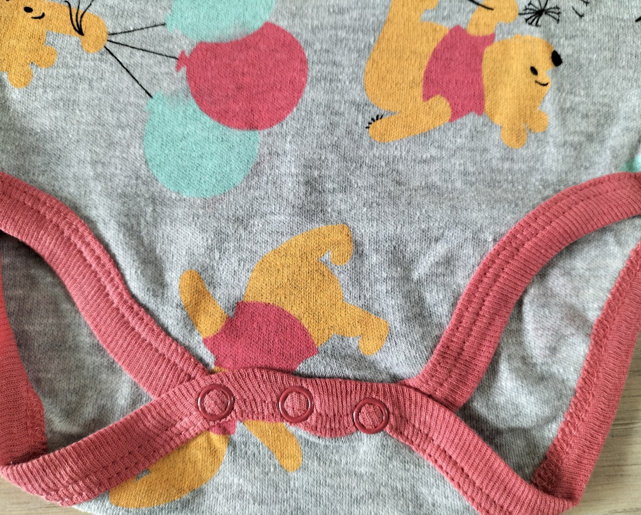Disney romper Winnie the Pooh grijs maat 62/68