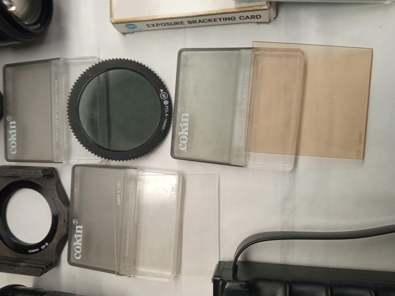 Minolta Dynax 7000i en 8000i met diverse objectieven en overige toebehoren