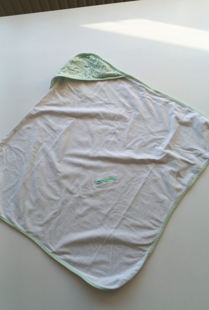 Wikkeldoek baby met uitsparing voor gordel