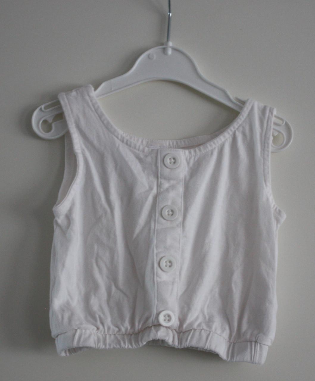 Witte top met knoppen maat 92