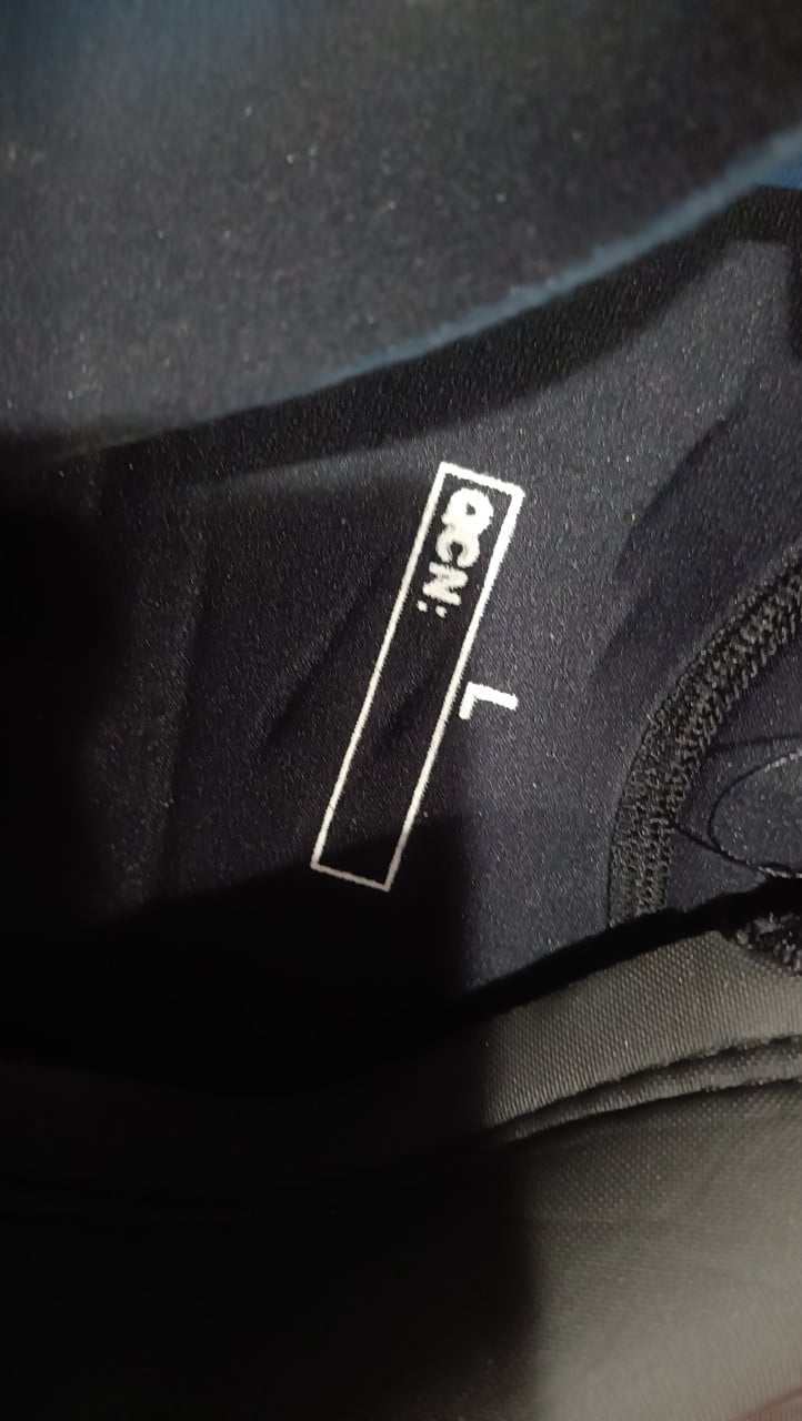 Te koop surfpak + zwemvest
