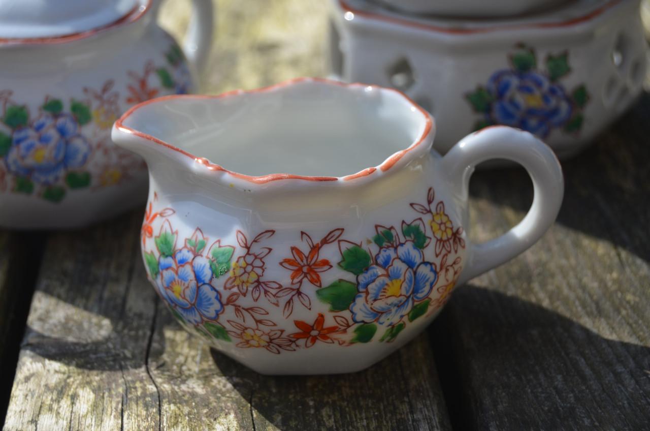 Prachtig kinder/poppenserviesje porselein