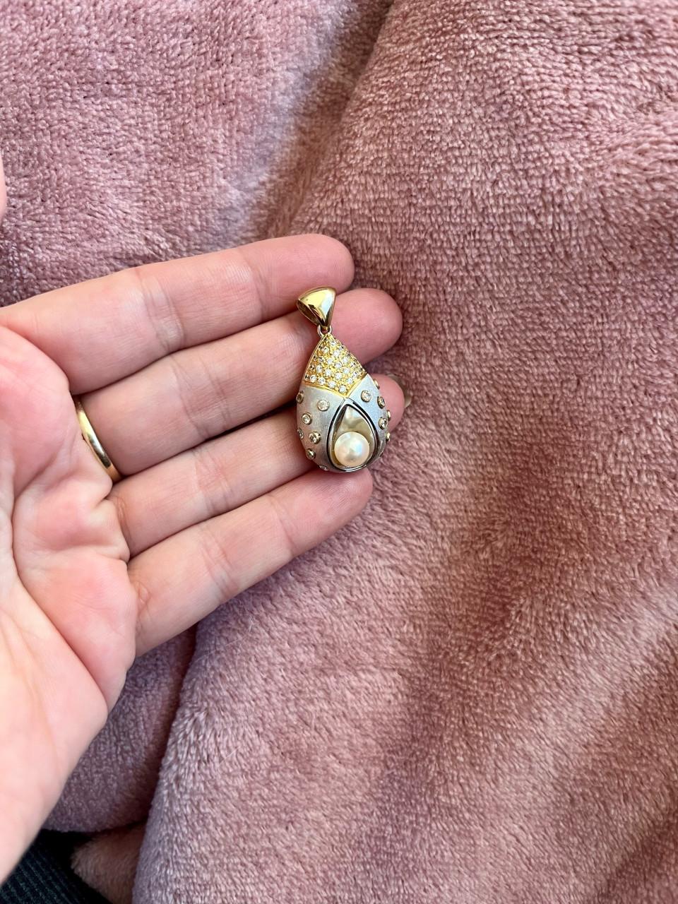 Prachtig 18 karaat gouden hanger met zirkonias en parel