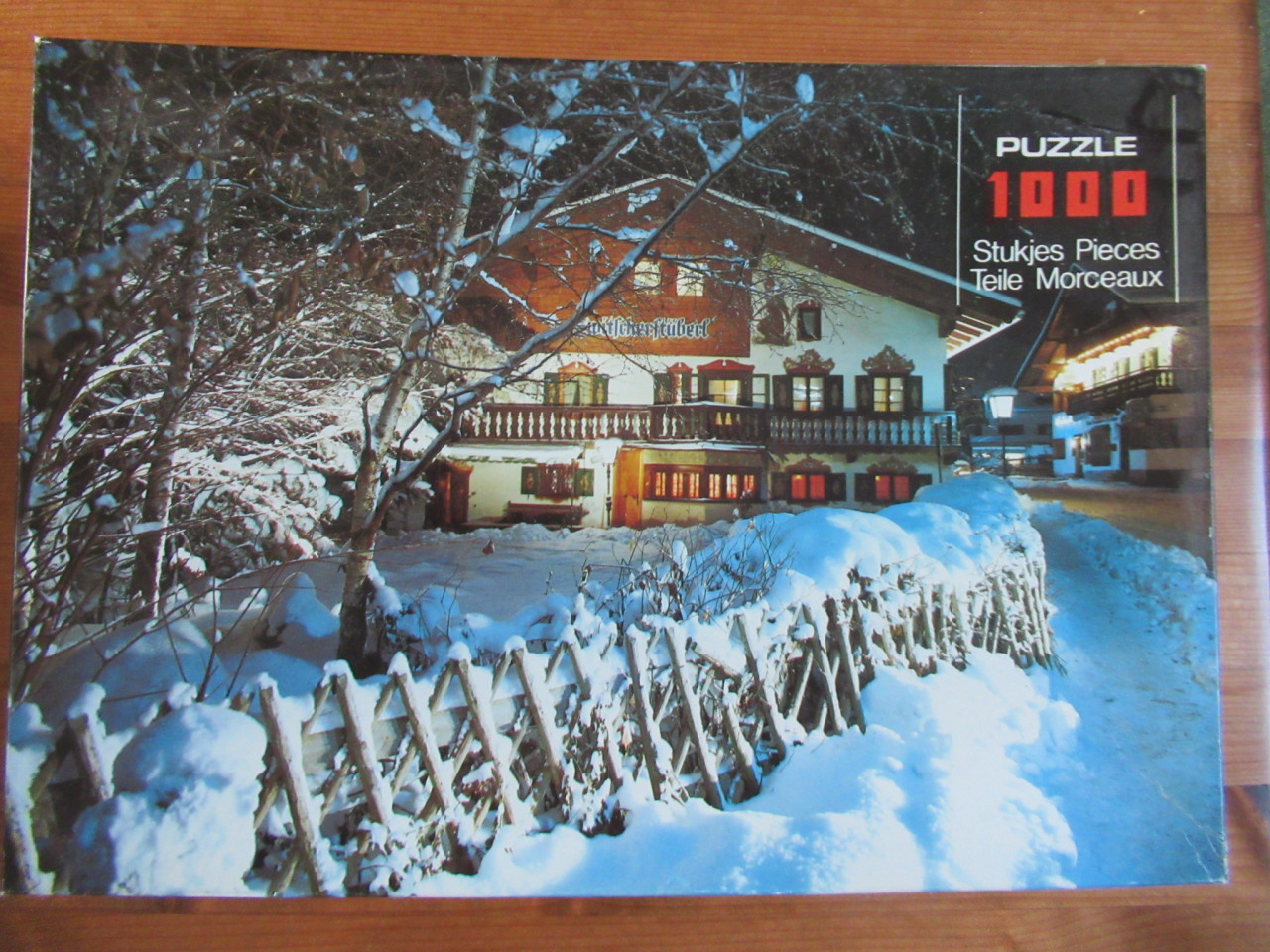 4 leuke volledige puzzels van 1000 stukjes.