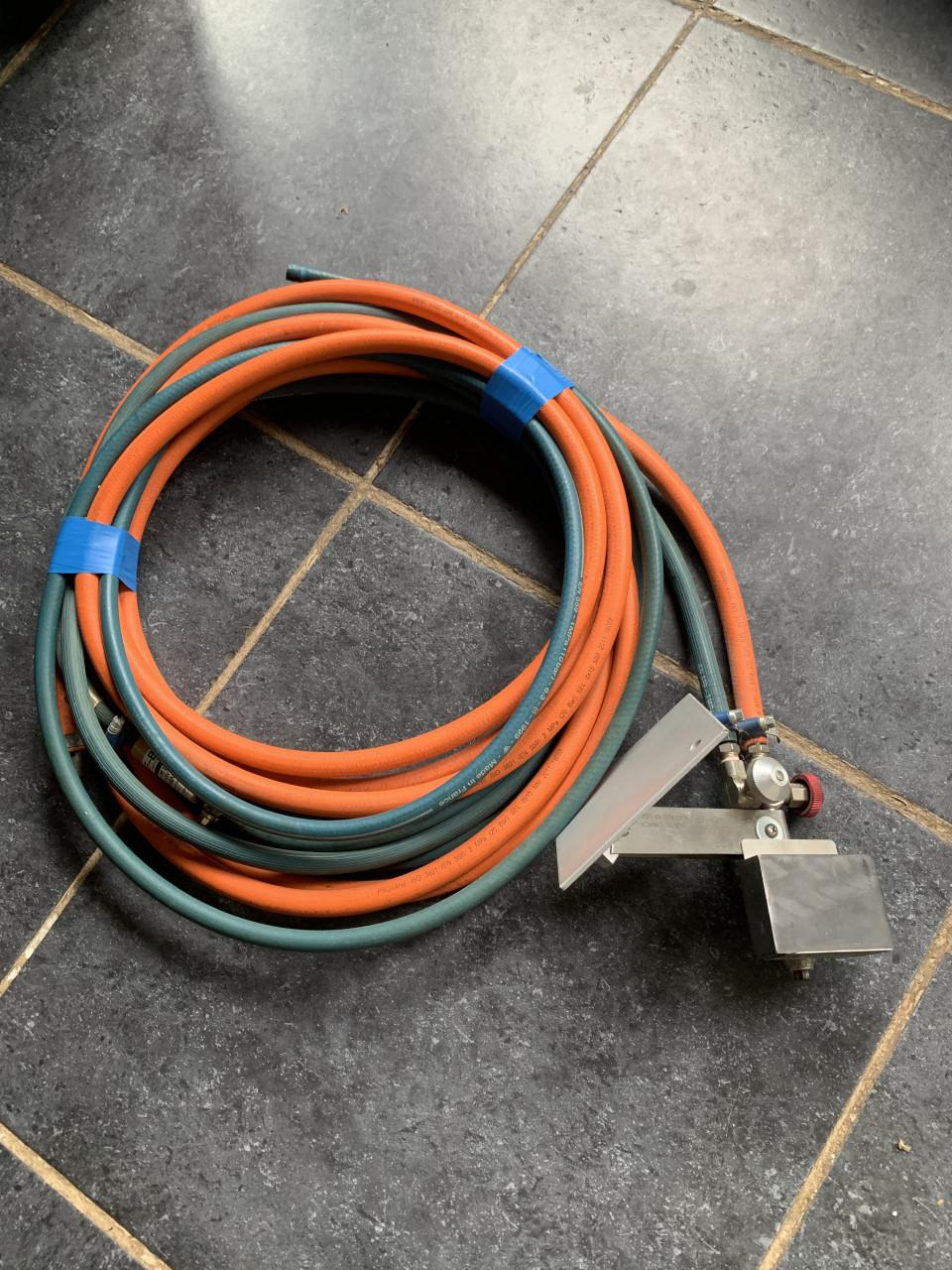 Te koop glasbrander met slang