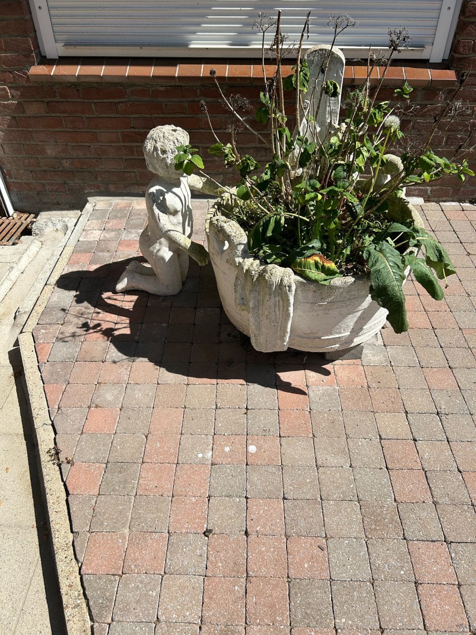 Gratis stenen beelden (plantenbak, ezel, paarden enz)