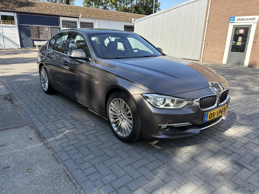 BMW 3-serie 328i high executive
