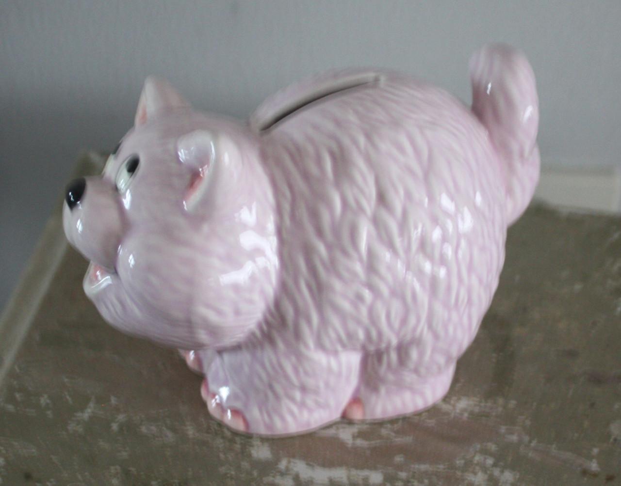 Leuk stenen lichtpaarse spaarpot kat