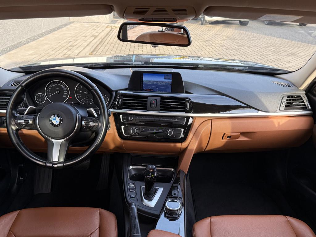 BMW 3-serie 320i high executive | harman/kardon | leder | v + a parkeersens