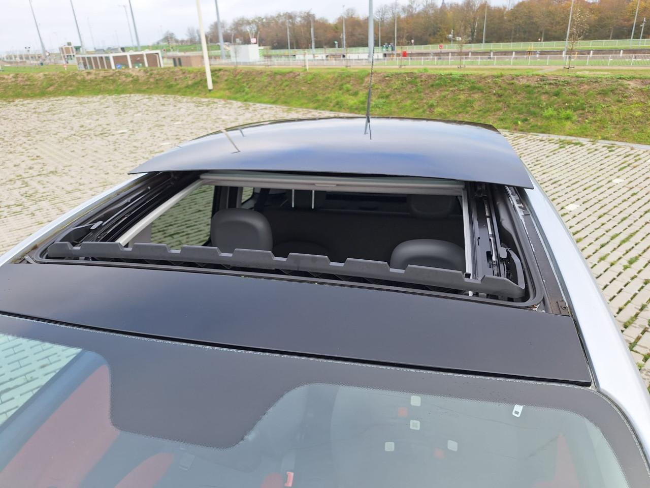 Fiat Panda 0.9 Twinair Lounge zilvergrijs met schuifdak 87.750 km 2014