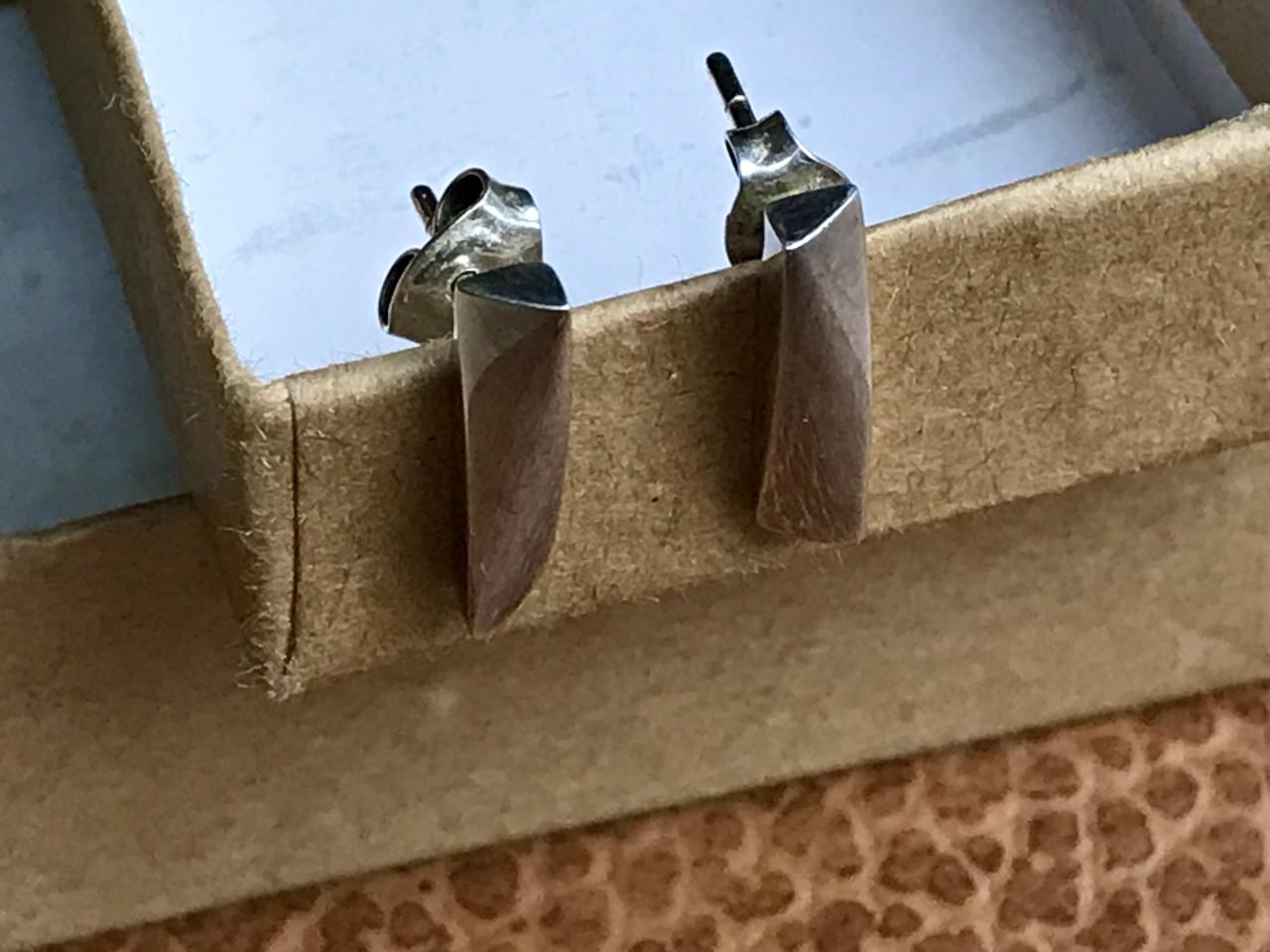 Zilveren ring met oorbellen van goudsmid Renate ritskes