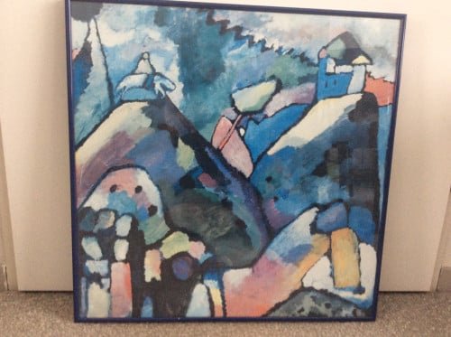Poster in blauwe lijst. AFM. 57x57 cm.