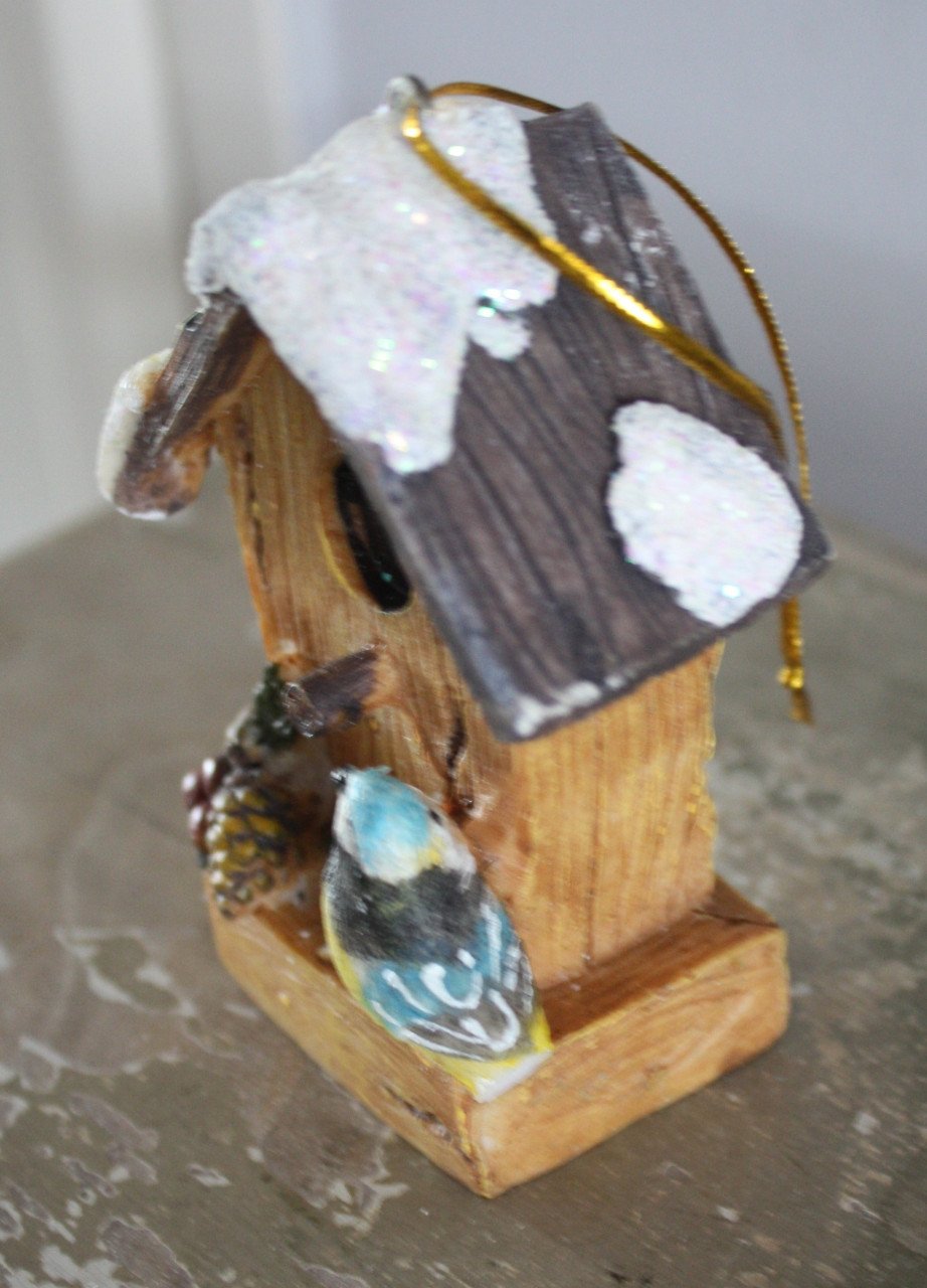 Stenen vogelhuisje hanger