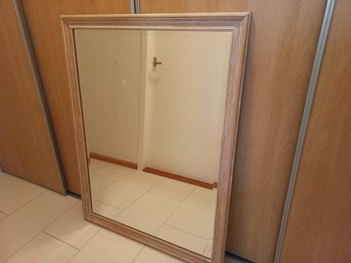 Grote wand spiegel met facet