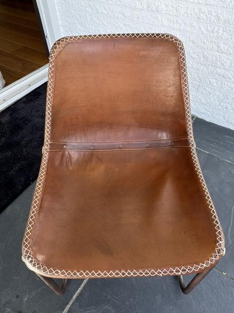 8 stuks lederen eetkamerstoelen