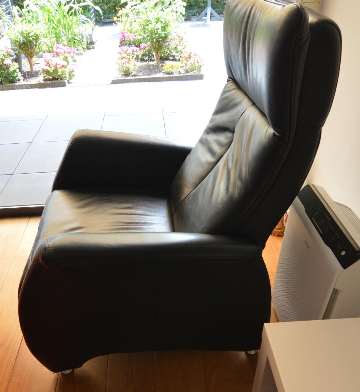 Uitklapbare lederen fauteuil