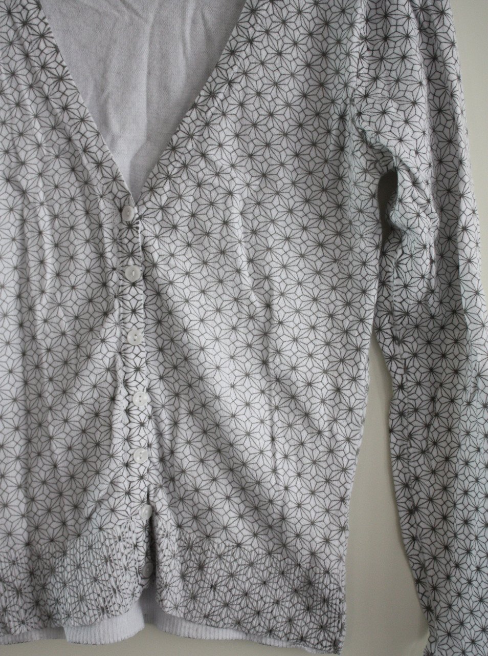 Witte vest met grijs werkje maat m
