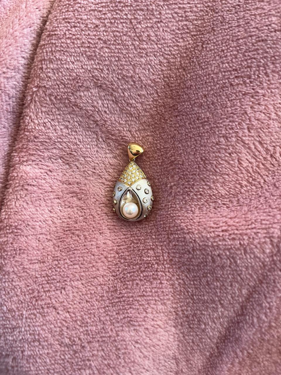 Prachtig 18 karaat gouden hanger met zirkonias en parel