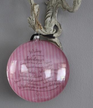 Kerstbalplat glas met tekst roze achtergrond