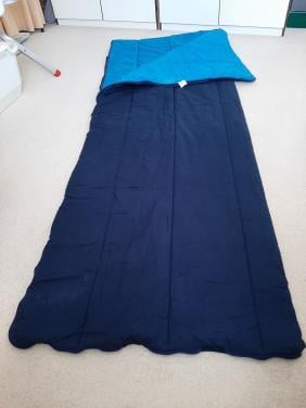 Warme slaapzak Polydaun in hoes. Envelop-model.