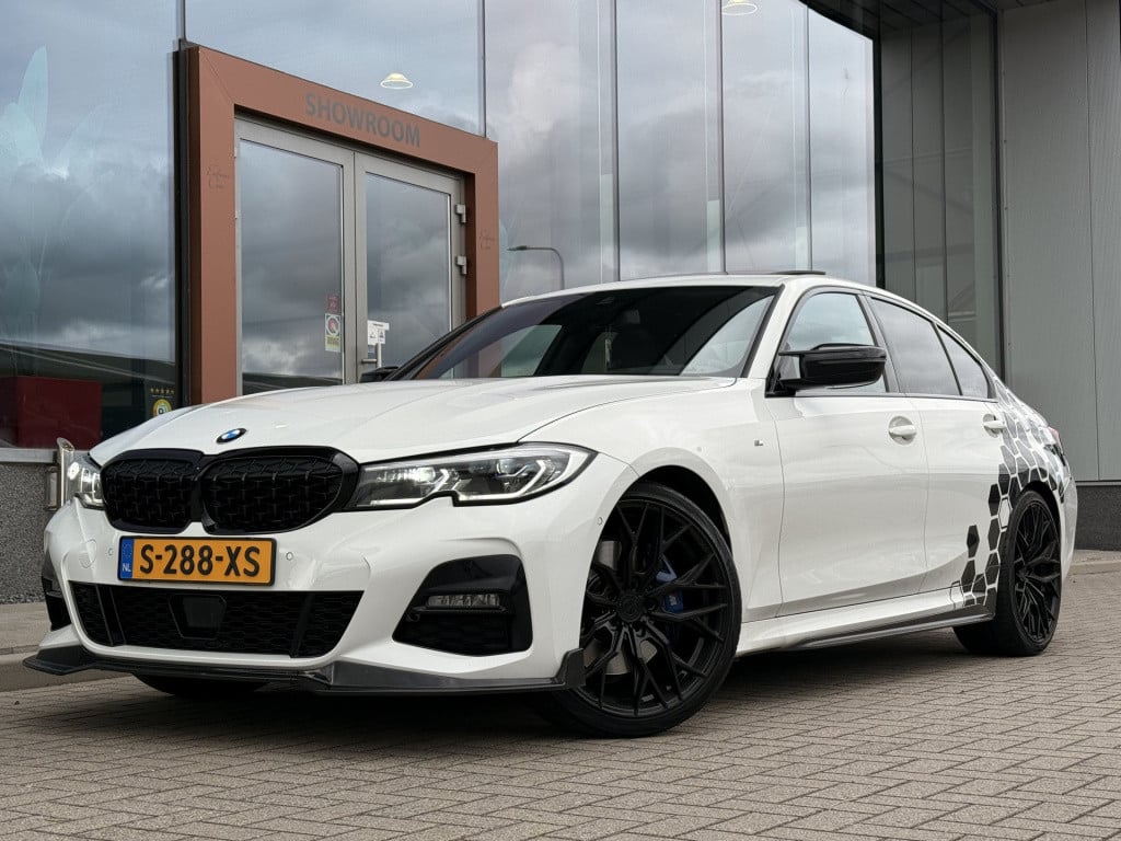BMW 3-serie 320i m-sport | schuifdak | acc | leder | memory | laser | 20 in