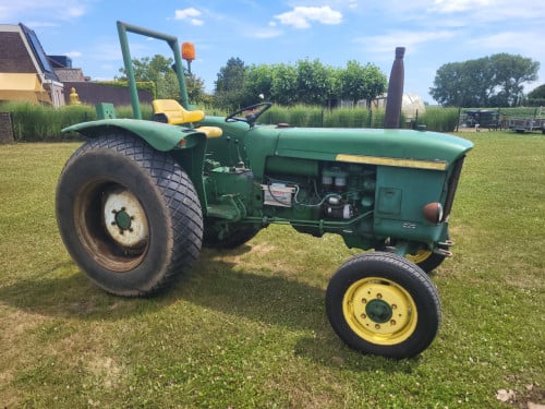 John Deere 310 met kenteken