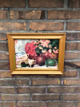 Mooie print in gelijst achter glas.