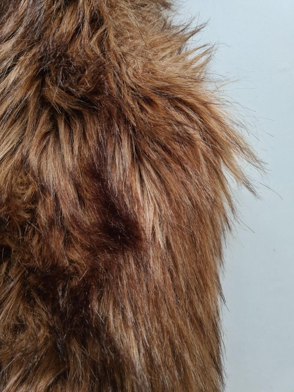 Mooie bruine fake fur lange bodywarmer van Forever21  Maat L