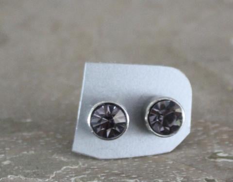 Zilver kleurige  oor stekers met grijs steentje
