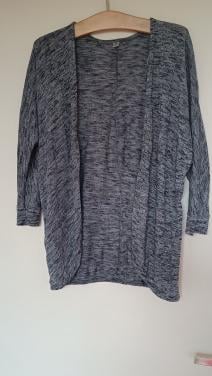 Vestje. Gemêleerd grijsblauw en zwarte korte streepjes/pikkel. Mt 36/38